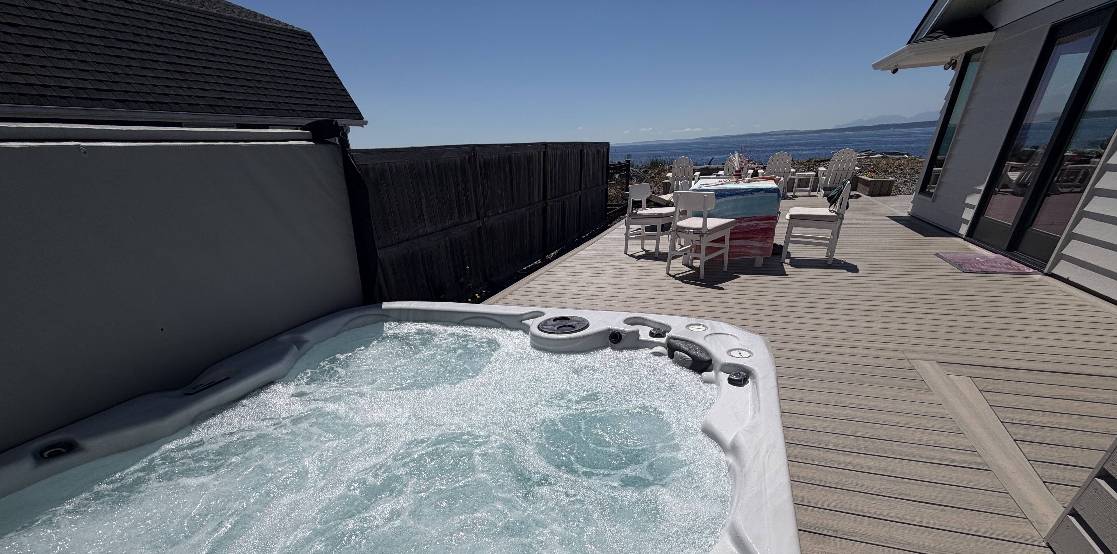 Hot tub installed under covered patio